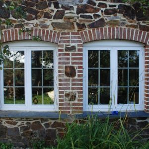 New Window Openings With Brick Reveals Slate Sills